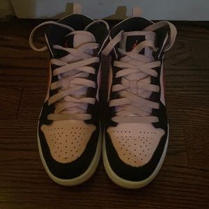 Pink and black Nike Jordan’s